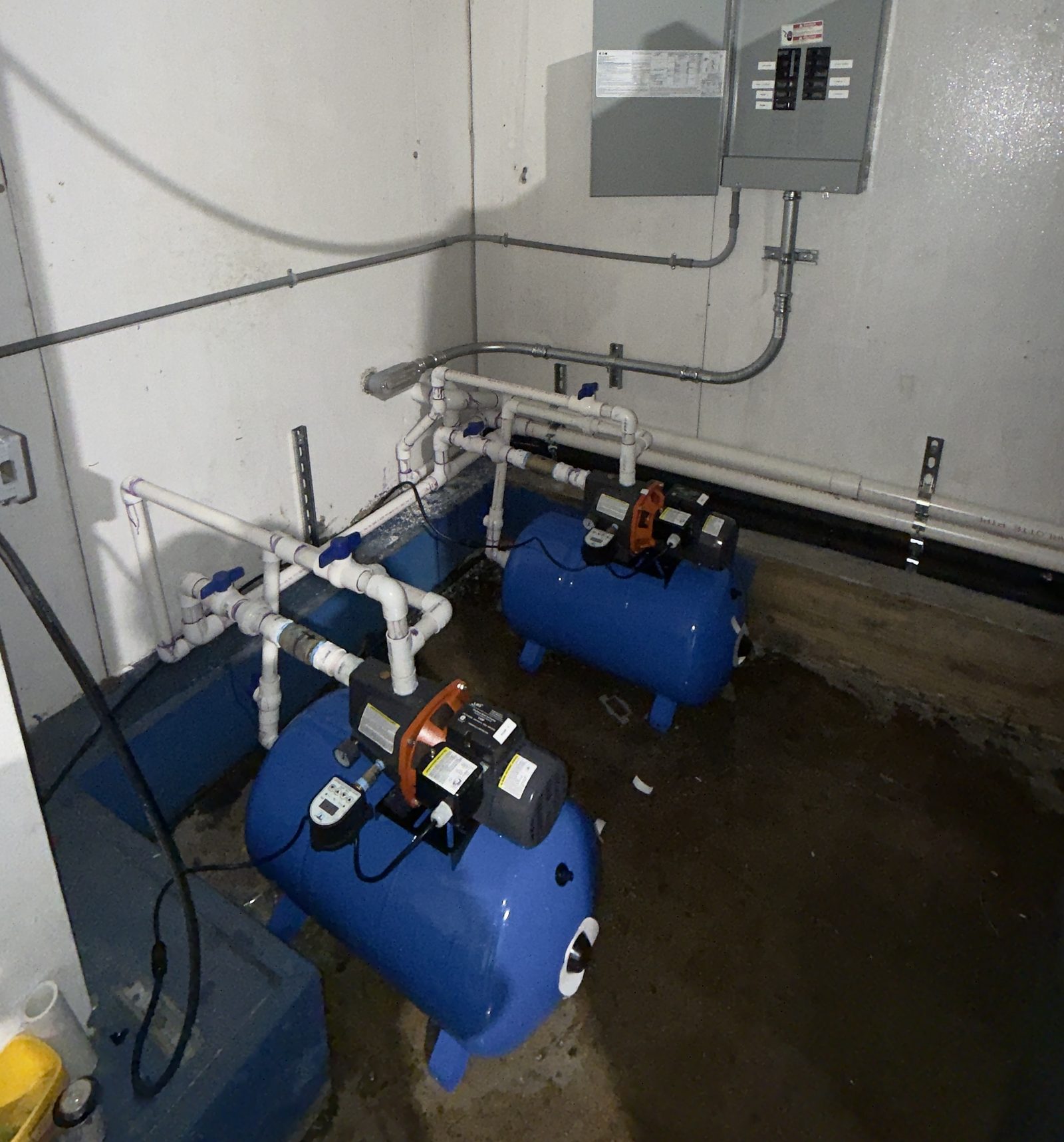 Water pump system with pressure tanks, PVC manifold and electrical panel